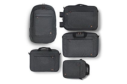 Flatlay of black Case Logic backpacks and briefcases with a white background.